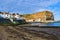 View of the Cod and Lobster and Penny Nab, from staithes Beach, near Scarborough, in North Yorkshire.