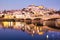 View Of Coimbra In Portugal And Mondego River At Night