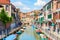 View  of colorful canal in Venice on  sunny  morning, Italy