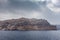 View of the colorful cliff of the caldera in the island of Santorini, Greece