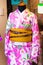 View of the colorful kimono in the store, Kyoto, Japan. Close-up. Vertical.