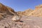 View of the colorful mountains and valley of Eilat Red Canyon against the blue sky