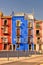 View of colorful ocean front homes in the Mediterranean town of Villajoyosa, Spain.