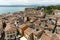 View of colorful old building in Sirmione and Lake Garda from Scaliger castle wall