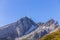 View of the colorful sunrise on the top the Santis mountain with its weather station as seen from the Schaefler peak in the