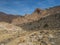 view of colorful volcanic scenic arid landscape of national park El Teide with lava rocks, mountains and vegetation at