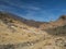 view of colorful volcanic scenic arid landscape of national park El Teide with lava rocks, mountains and vegetation at