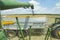 View from the combine cab to the rapeseed area where the harvest is taking place. The theme is agriculture. Combine harvester