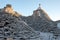 View of conical roofs of traditional trulli houses in Alberobello in the Itria Valley, Puglia Italy