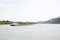 View on a container ship on and the natural landscape at the rhine in Koblenz rhine and surrounding