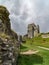 View of Corfe Castle ruins with dramatic sky 