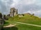 View of Corfe Castle ruins with dramatic sky