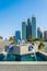 View of a corniche in Abu Dhabi stretching alongside the business center full of high skyscrapers