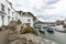 View between cottages, at the historic and quaint fishing harbour of Polperro, Cornwall