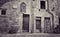 View of courtyard and apartment doors in Lucca