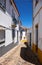 The view of cozy narrow street of Evora. Portugal