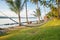 View of cozy straw hammock on the tropical white beach