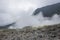 view of crater on active mountain with sulfur gas come out from stone. Beautiful landscape of mount Papandayan. Papandayan