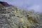 view of crater on active mountain with sulfur gas come out from stone. Beautiful landscape of mount Papandayan. Papandayan