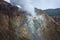 view of crater on active mountain with sulfur gas come out from stone. Beautiful landscape of mount Papandayan. Papandayan