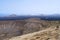 View of the crater of the Caldera Blanca volcano and the island of Lanzarote