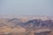 View of the crater from the rock. National park HaMakhtesh Mitzpe Ramon. Unique relief geological erosion land form. Negev,Israel