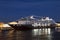 View of cruise ship Azamara at the pier on the English embankment of the Neva river at night, St. Petersburg,