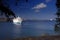 A view of a cruise ship in the beautiful Aegean sea in the island of Patmos, Greece in summer time