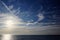 View from a cruise ship of feathery clouds over the North Pacific Ocean