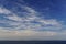 View from a cruise ship of feathery clouds over the North Pacific Ocean