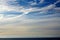 View from a cruise ship of feathery clouds over the North Pacific Ocean