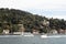 View of cruise tour boat and yacht on Bosphorus and historical and traditional mansions in Kandilli area