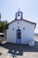 View of the Cycladic style Greek Church on the beach on the Greek island of Evia in Greece on a Sunny day