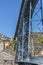 View of D. Luis bridge, with tourists enjoying and Porto downtown on background