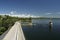 view of a dam that forms a reservoir in a mountainous context. Dinghies sailing on the lake. Embalse de Rio Tercero, CÃ³rdoba,
