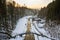 View from the dam in Miedzygorze, flowing river in a mountain valley in winter