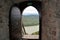 View of the Danube through the doorway of the watchtower of the castle in Visegrad in Hungary