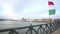 View of Danube river and Hungary flag from the chain bridge in Budapest