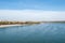 View of Danube river Petrovaradin fortress and city beach Strand of Novi Sad Serbia with blue sky above on sunny autumn day