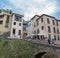 View at the Darro Street, Paseo de los tristes, cabrera bridge, touristic people visiting iconic and picturesque street, Alhambra