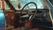 View of dashboard panel and steering wheel of antique car Triumph