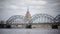 View through the Daugava River of the Riga railway bridge and the Building of Academy of Sciences of Latvia, Riga Latvia