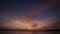 view of dawn clouds above sea island and boat