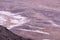 View of the Death Valley, California, with salt deposits sediments winding through the land.