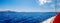 View from the deck of a sailboat while sailing the blue waters of the Greek Islands