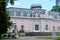 View of the delicate pink and white faÃ§ade of Benrath Palace.