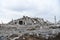 View of the demolition of a multi-storey building. Dismantling and demolition of buildings and structures. Destroy concrete