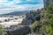 View of Demre town in Turkey - rock tombs of ancient Myra and modern agricultural greenhouses