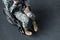 View of depressed disabled man in military uniform sitting in wheelchair