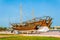 View of a dhow ship in front of the naval museum in Kuwait